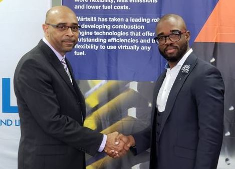 Edmund Phillips of Wartsila with Whitey Heastie, chief executive officer of Bahamas Power and Light